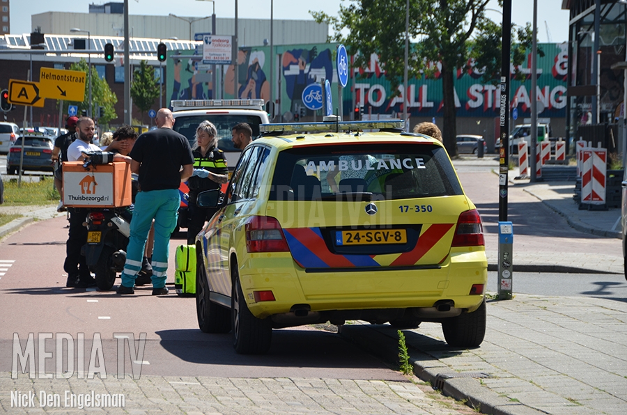 Bezorgscooter aangereden Marconistraat Rotterdam