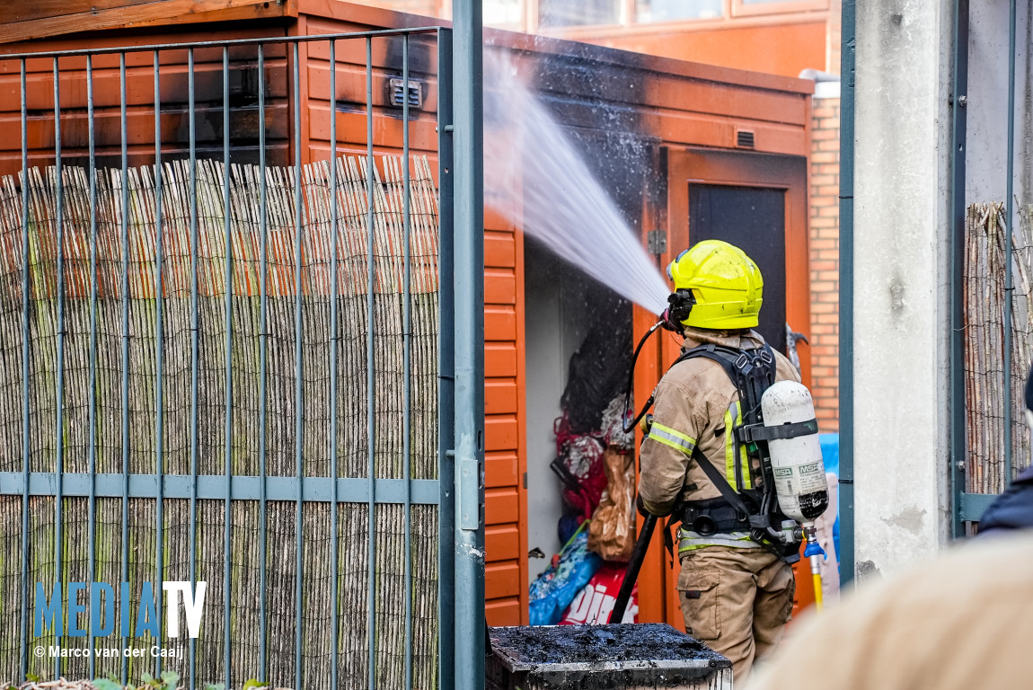 Veel schade aan schuur in achtertuin door brand Eduard van Beinumlaan Schiedam