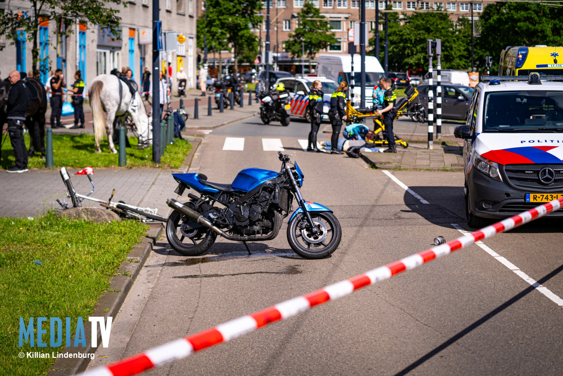 Twee gewonden na aanrijding tussen motor en fiets Mathenesserplein Rotterdam