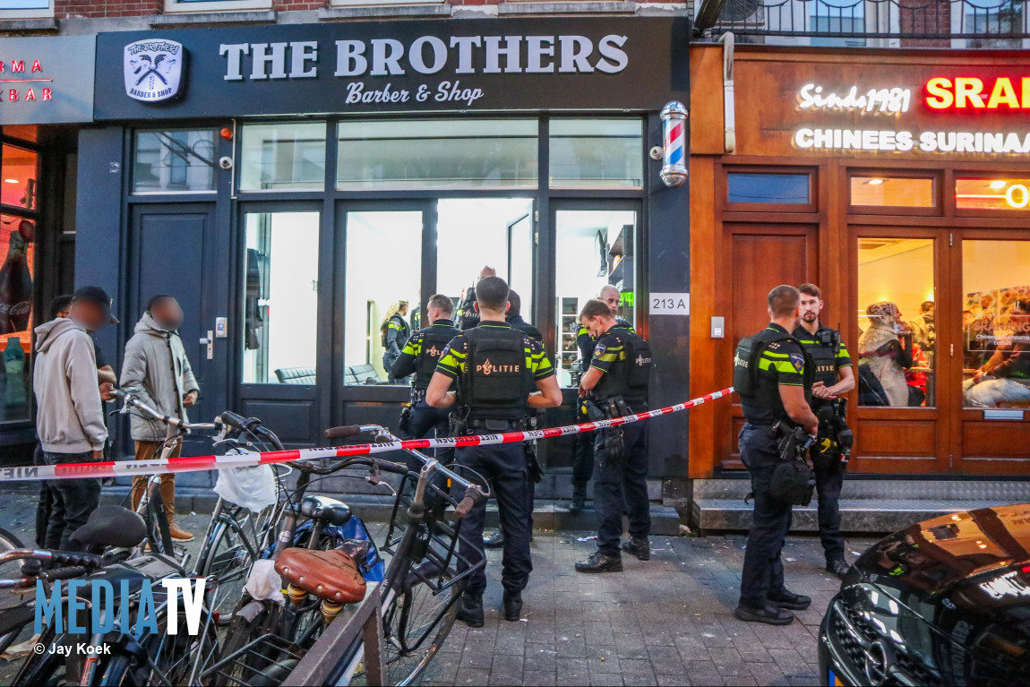 Man met vuurwapen op hoofd geslagen bij vechtpartij Nieuwe Binnenweg Rotterdam