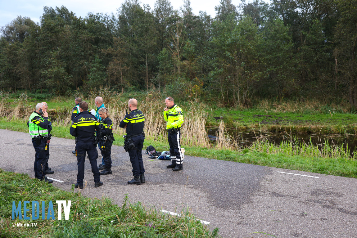 Auto met vier inzittenden te water N210 Krimpen aan de Lek